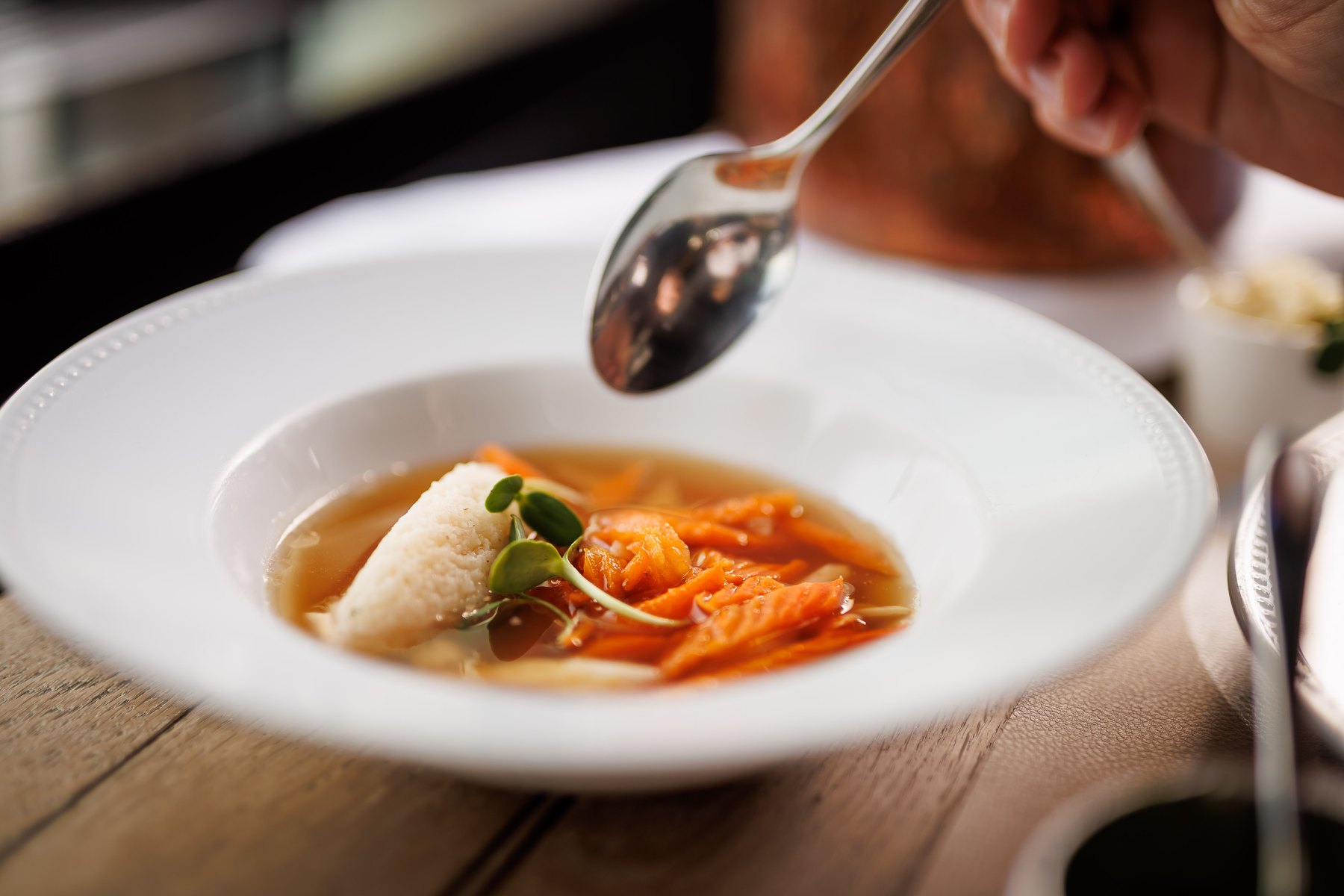 Beef broth with semolina dumplings
