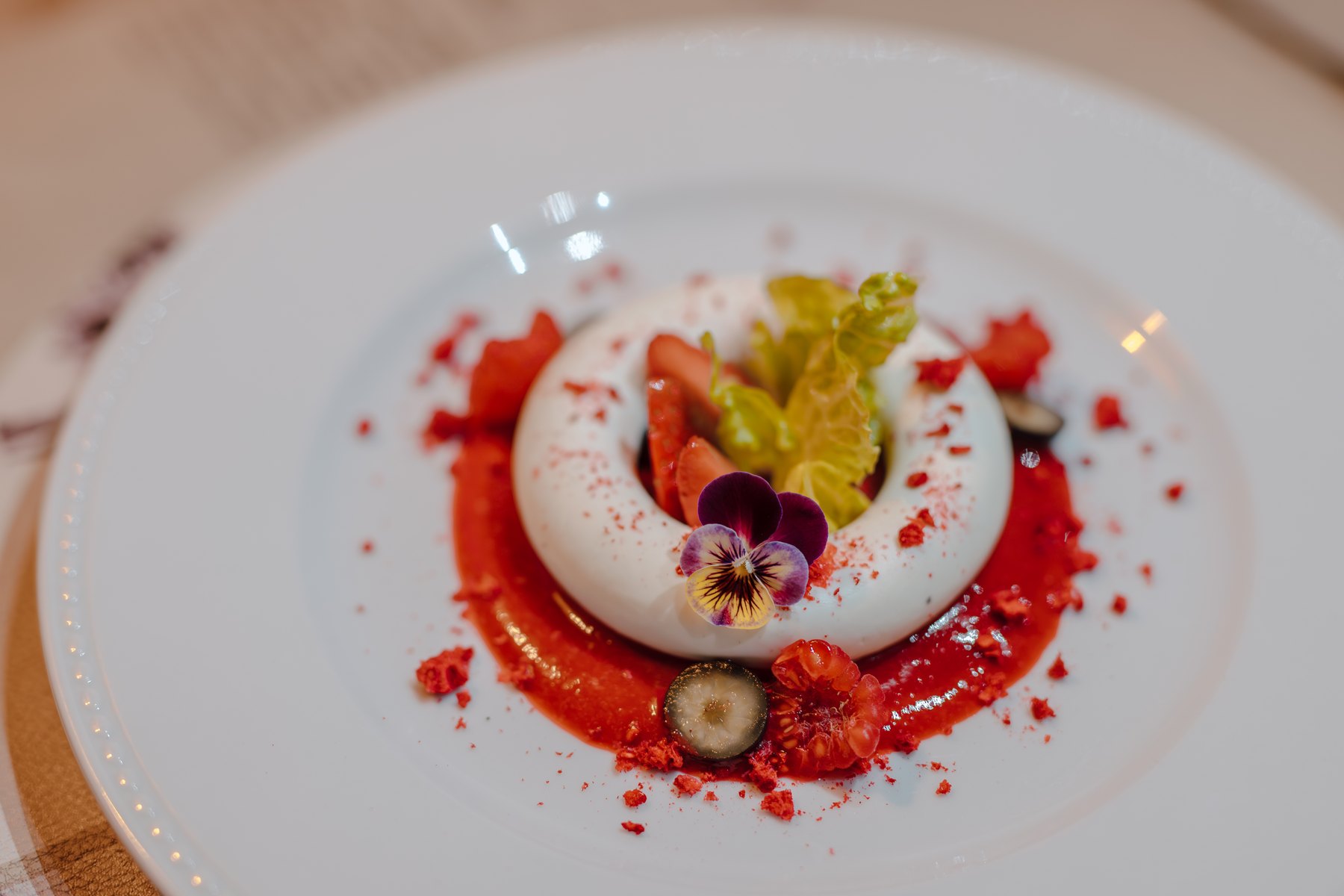 Goat cheese with basil-marinated raspberries